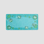 Frogs in a pond desk pad