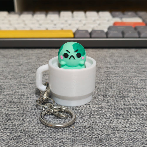 angyfrog in a mug clicker keychain