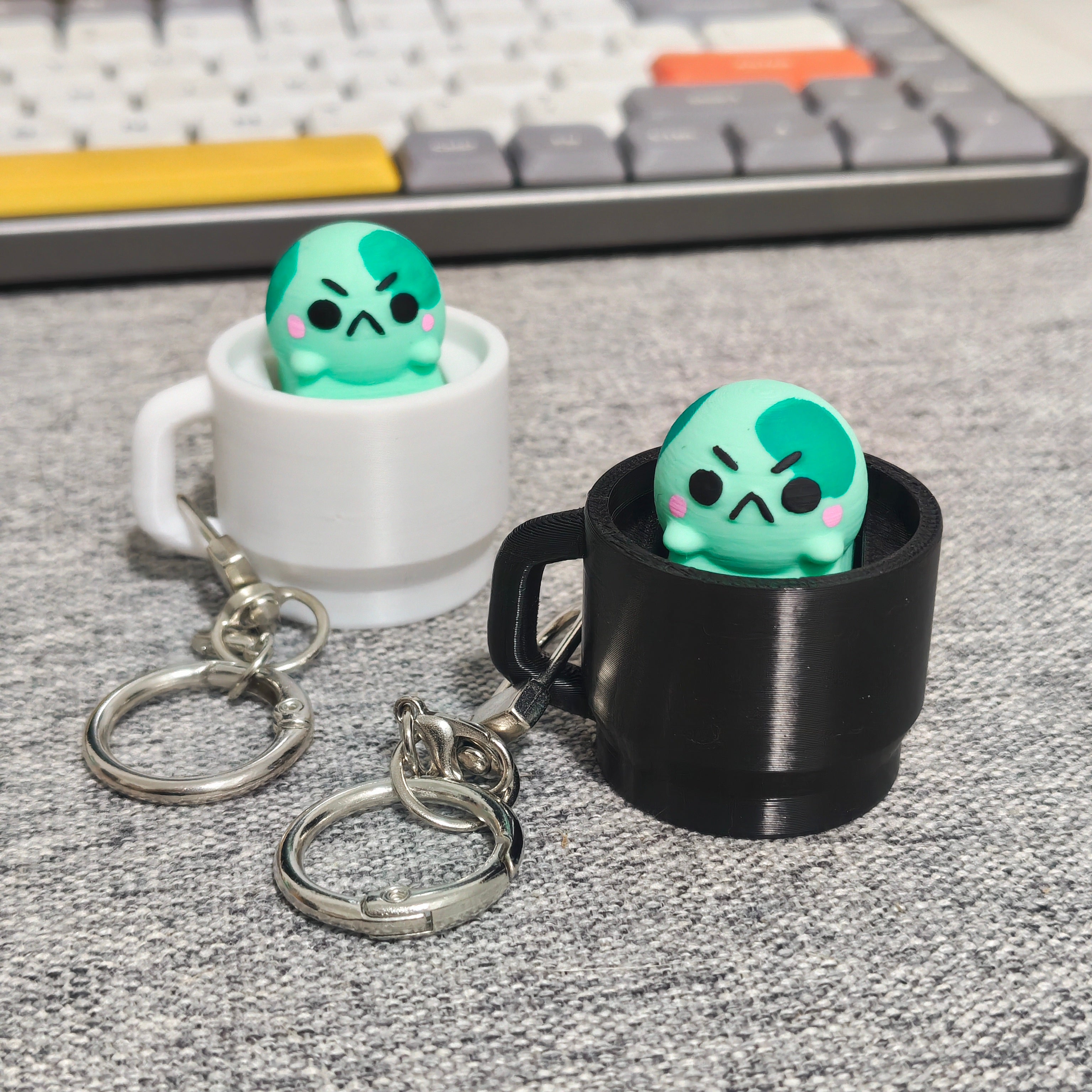 angyfrog in a mug clicker keychain